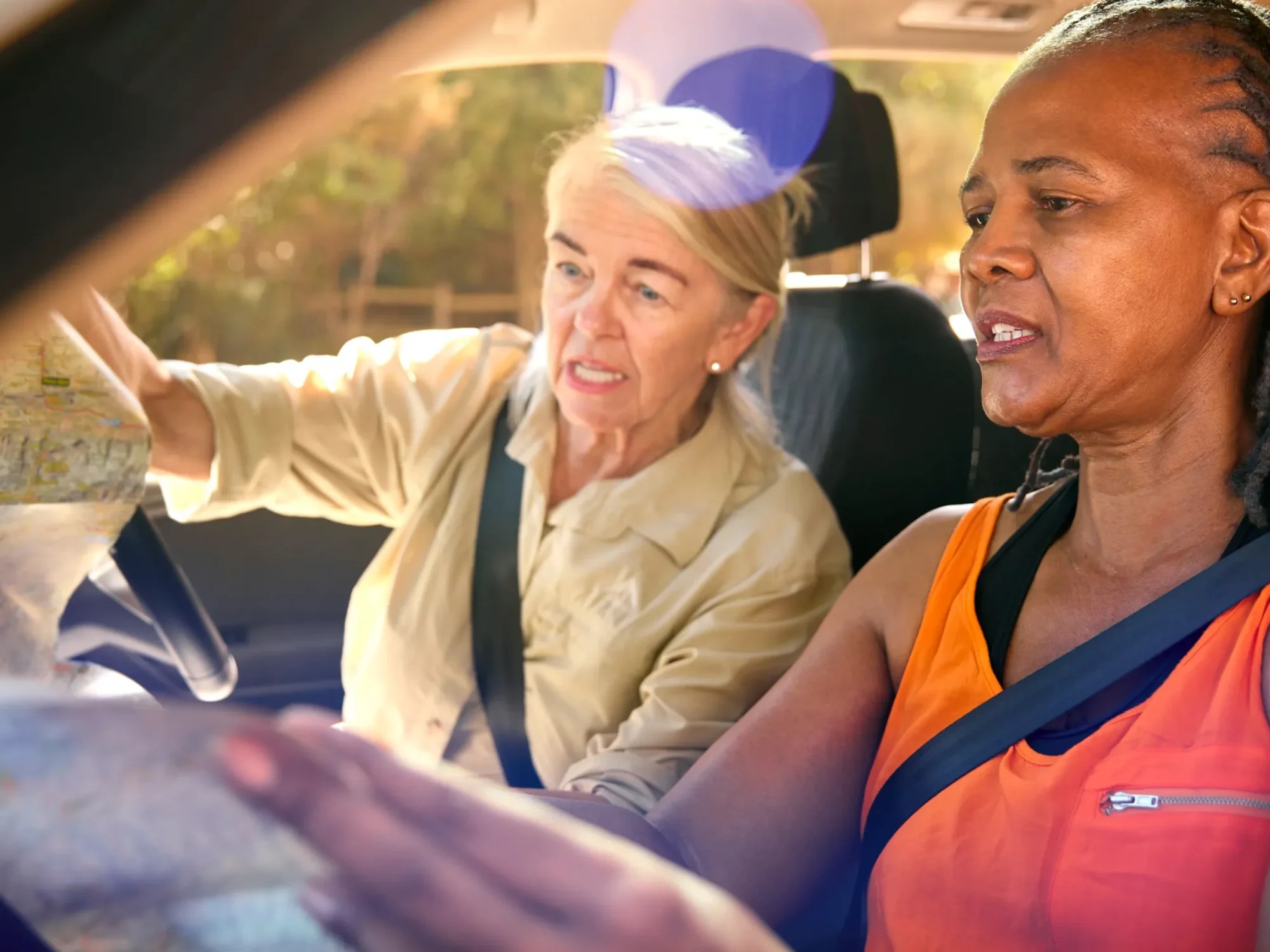 two-confused-senior-female-friends-on-day-trip-out-2024-10-19-06-02-06-utc 1